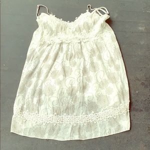 A white dress with gray flowers